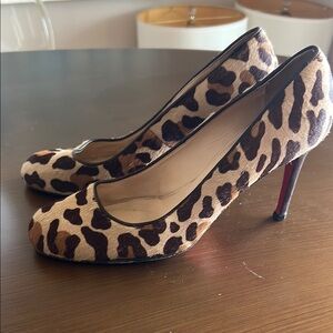 Christian Louboutin Leopard print ponyhair almond toe high heeled pumps sz 39.5